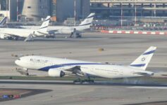 a group of airplanes on a runway