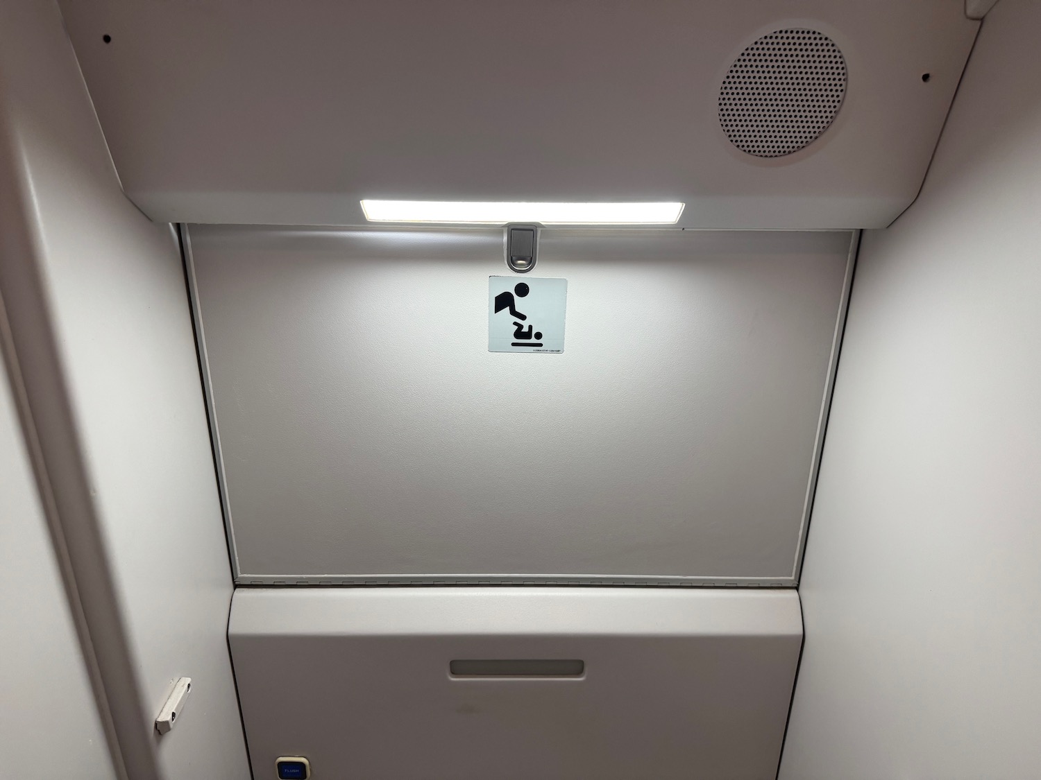 a white door with a sign on it