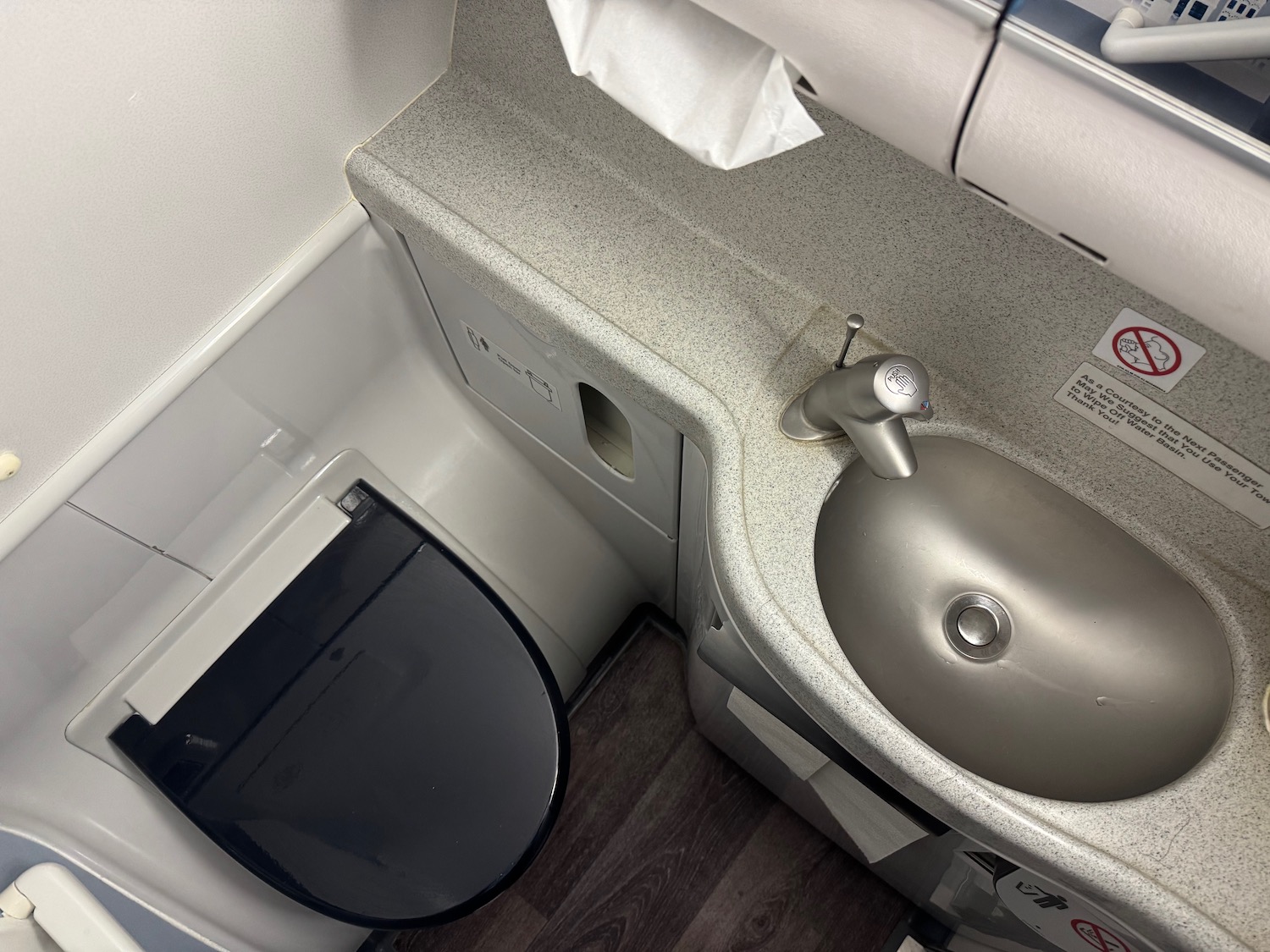 a sink and toilet in a bathroom