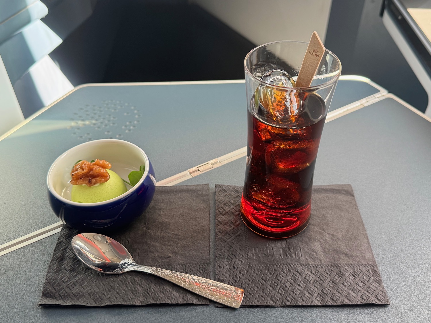 a glass of ice tea and a bowl of ice cream