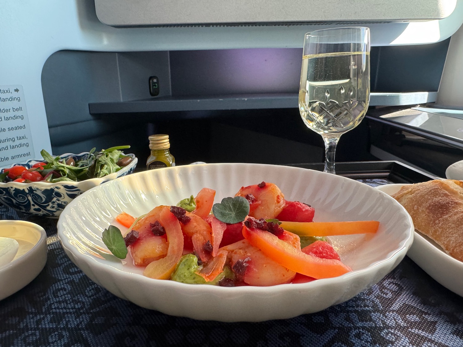 a bowl of fruit and vegetables on a table