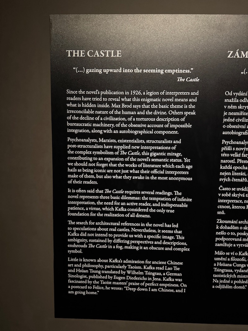 a black and white sign with white text