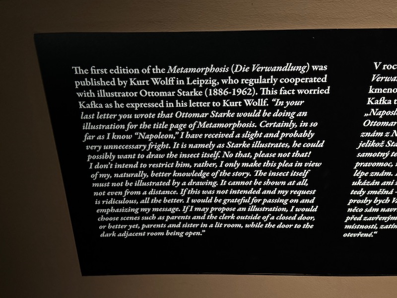 a black sign with white text on it