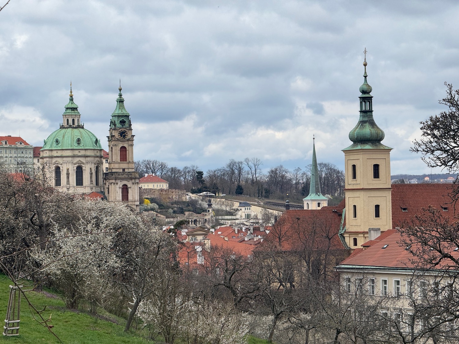 a group of buildings with towers and trees