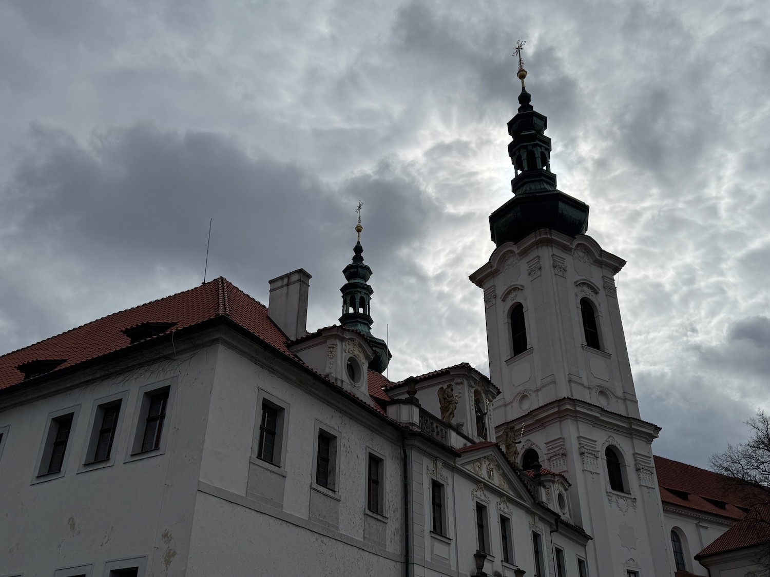 St. Nicholas' Church, Tallinn with a steeple and a cloudy sky