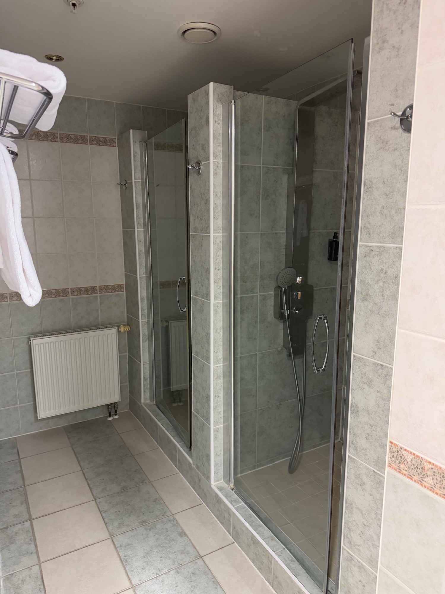 a shower with glass doors