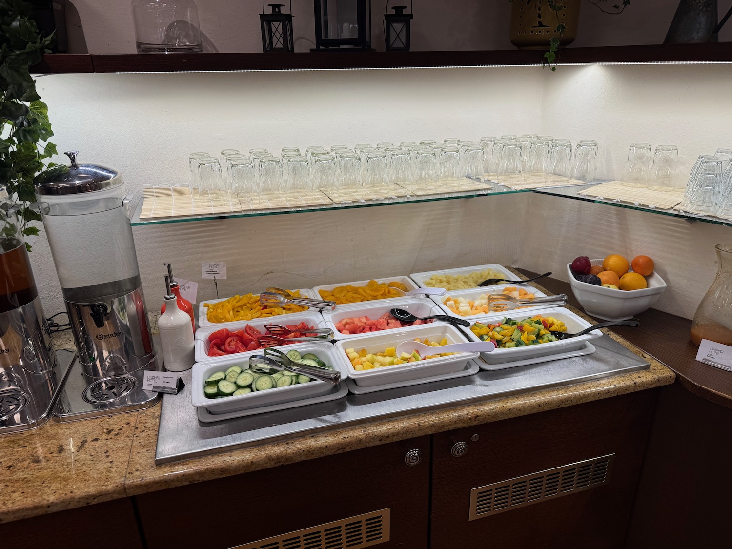 a buffet with different food items on it