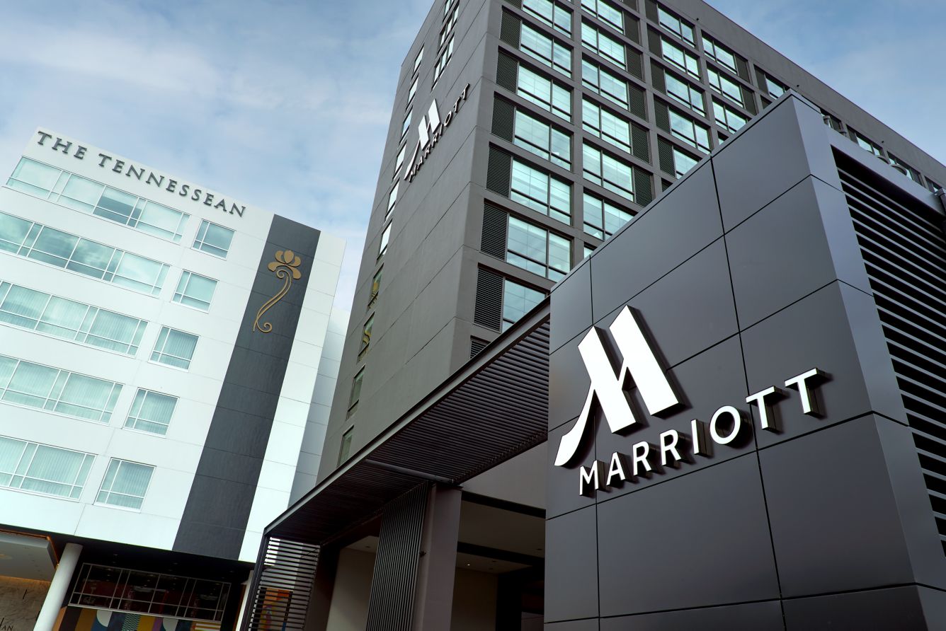 a group of buildings with a sign