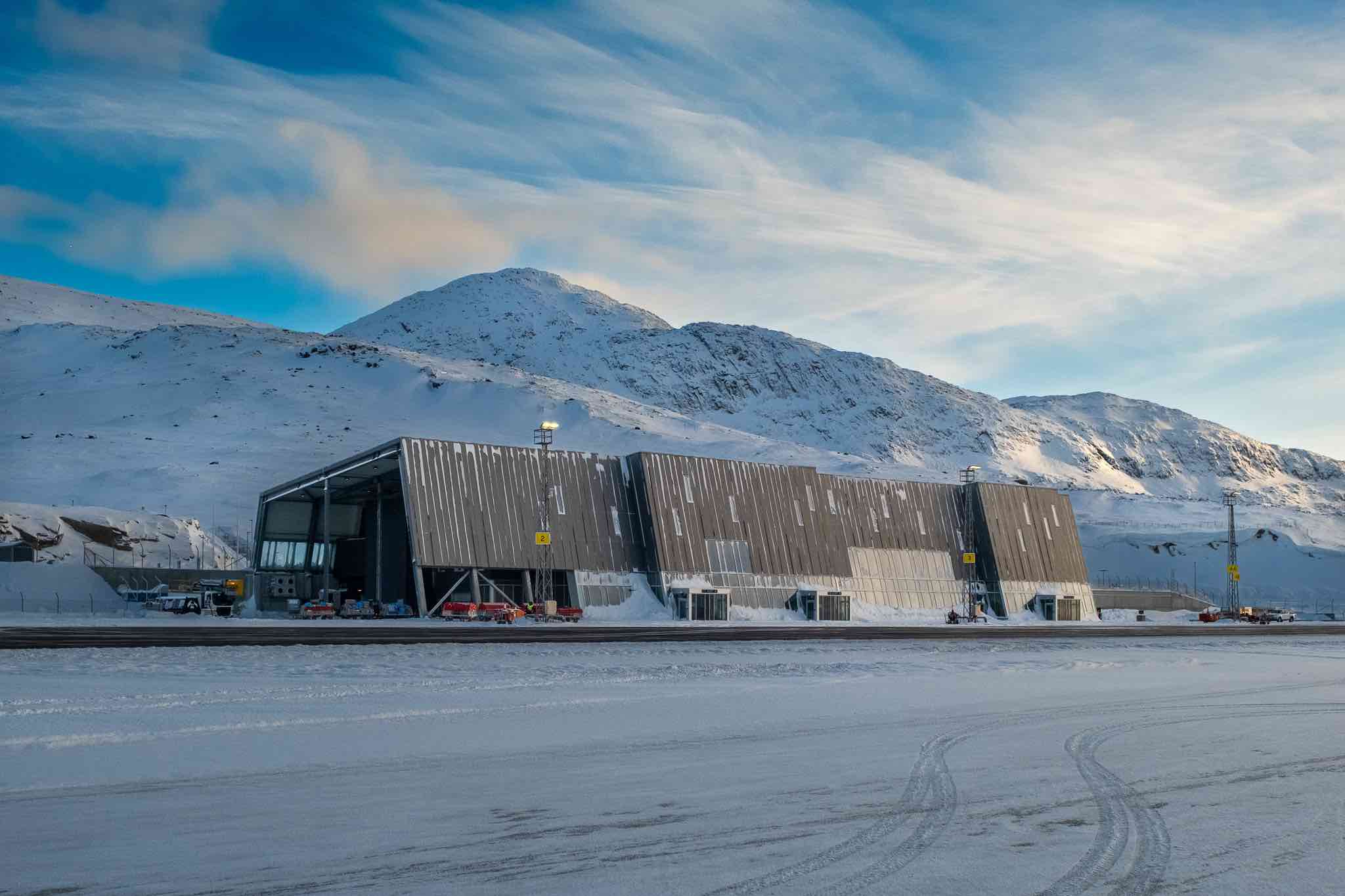 a building with snow on the side