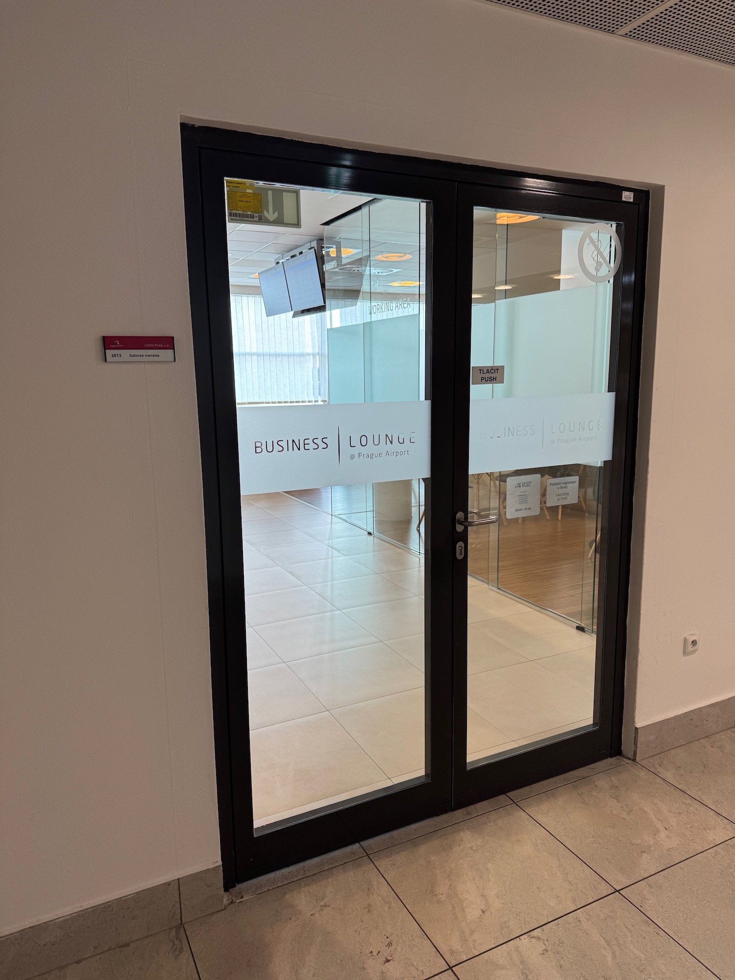 a glass doors with signs on them