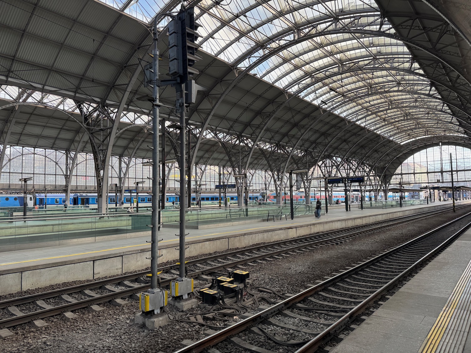 a train station with a glass roof