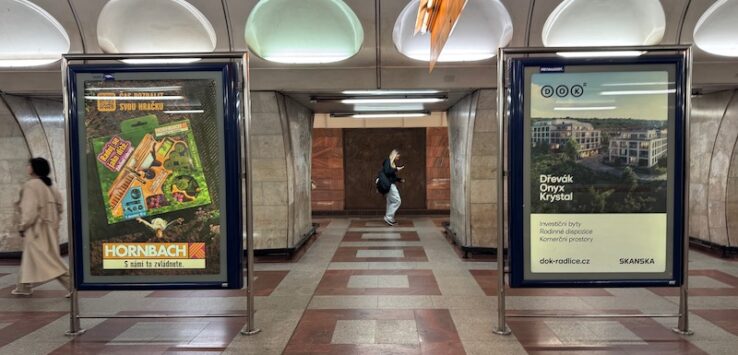 a person standing in a subway station