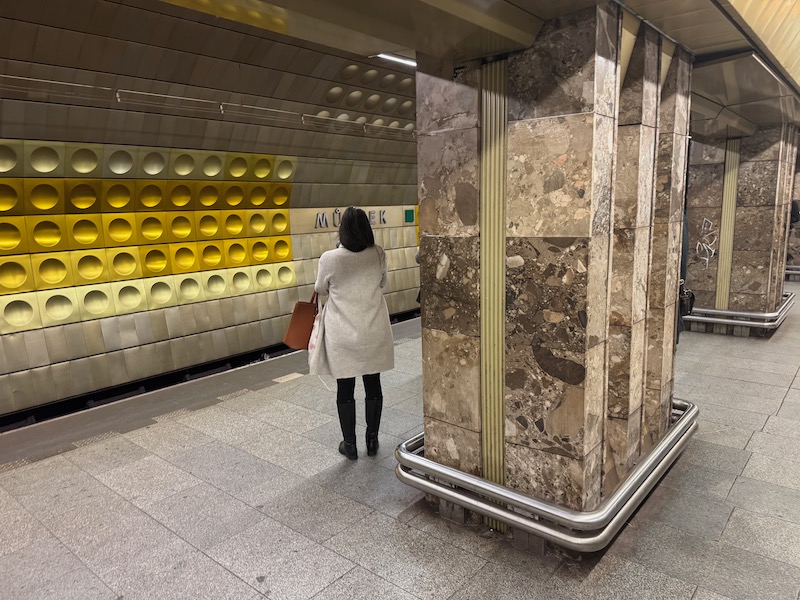 a woman in a subway station
