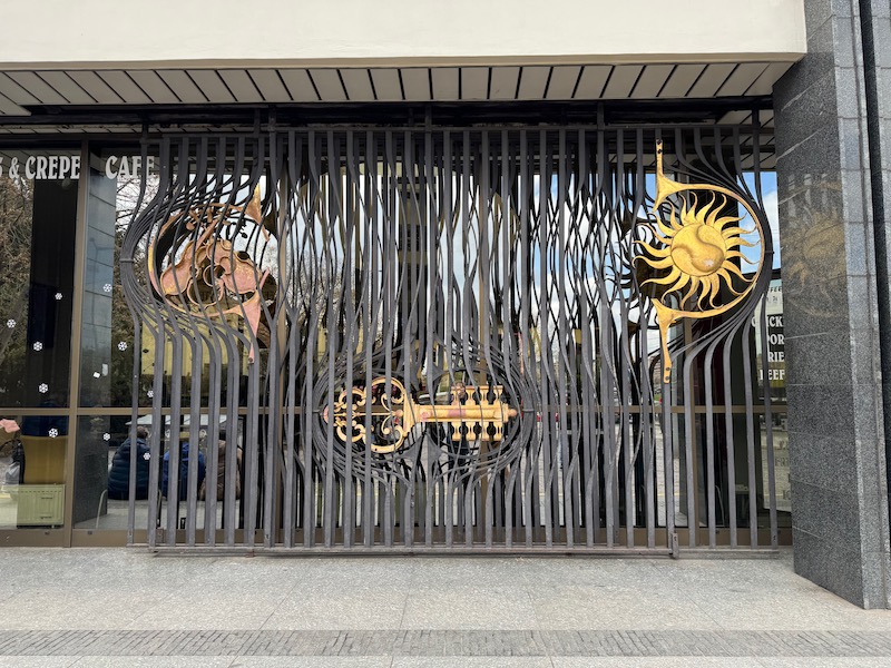 a gate with a metal fence