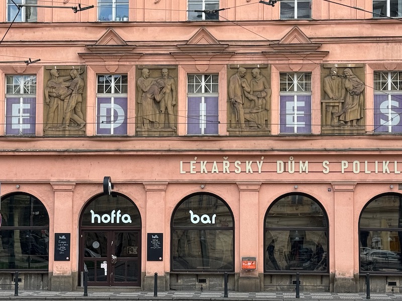 a building with statues on the front
