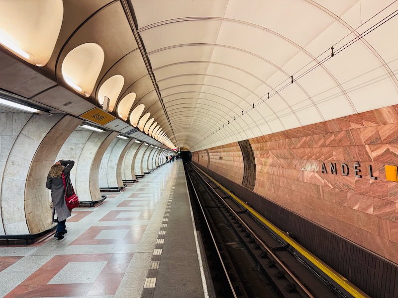 a woman standing on a train track