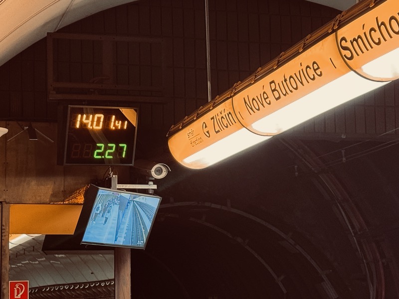 a sign with a digital screen and a monitor