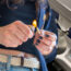 a person lighting a match