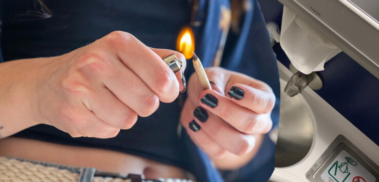 a person lighting a match