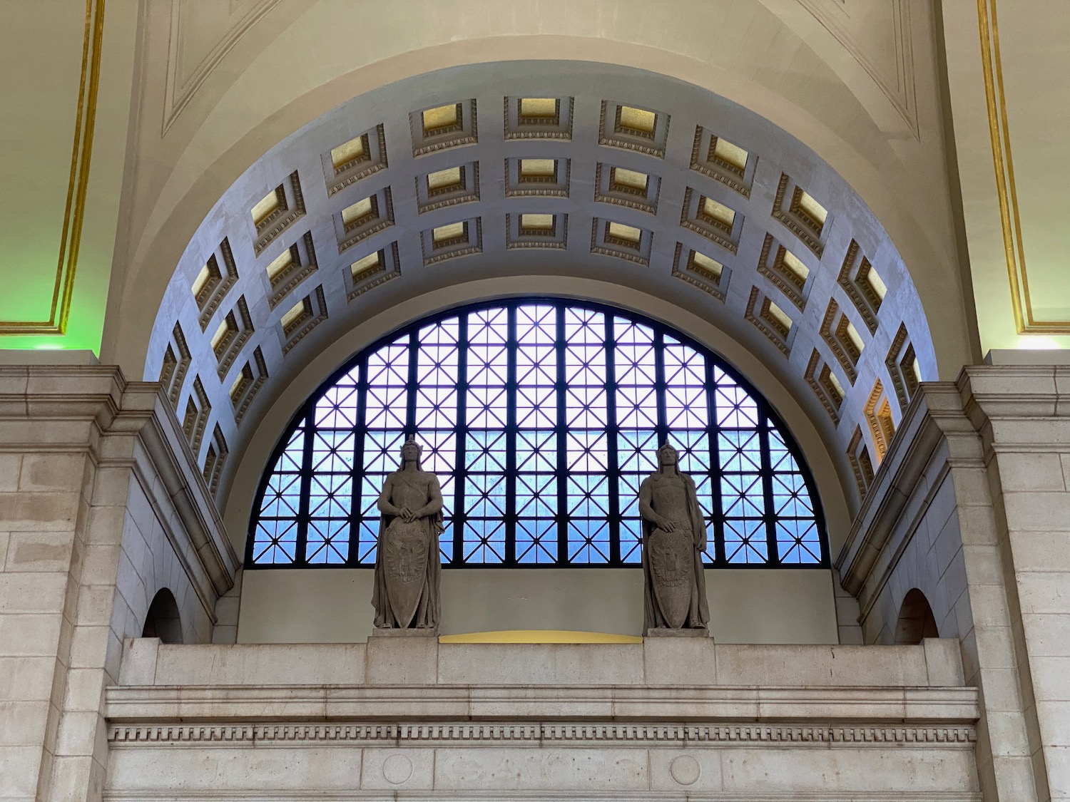 a statue of a man and woman in a building