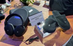 a table with black slippers and headphones