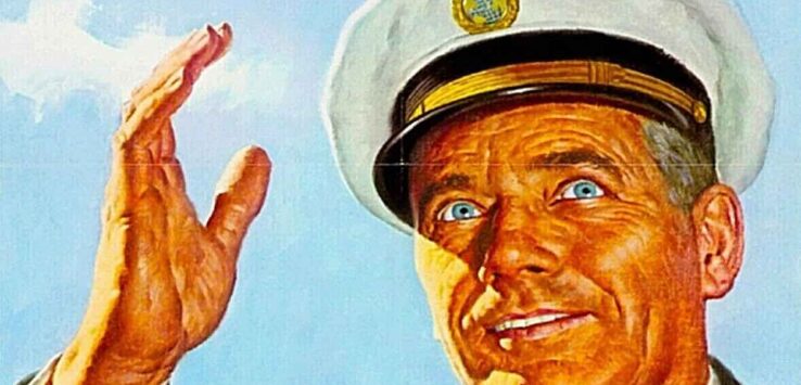 a man in a uniform waving