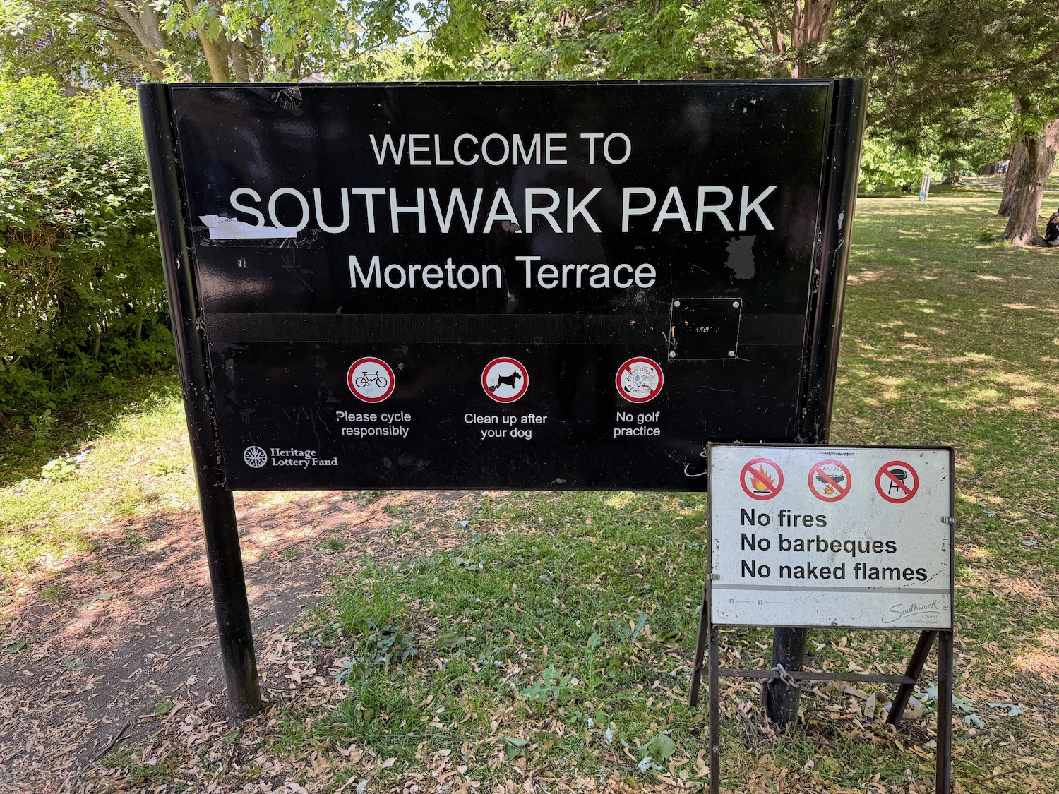 a sign in a park