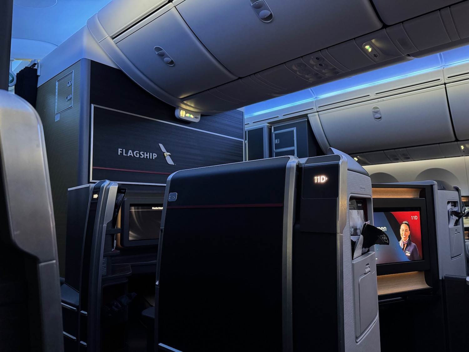 an airplane with seats and a screen