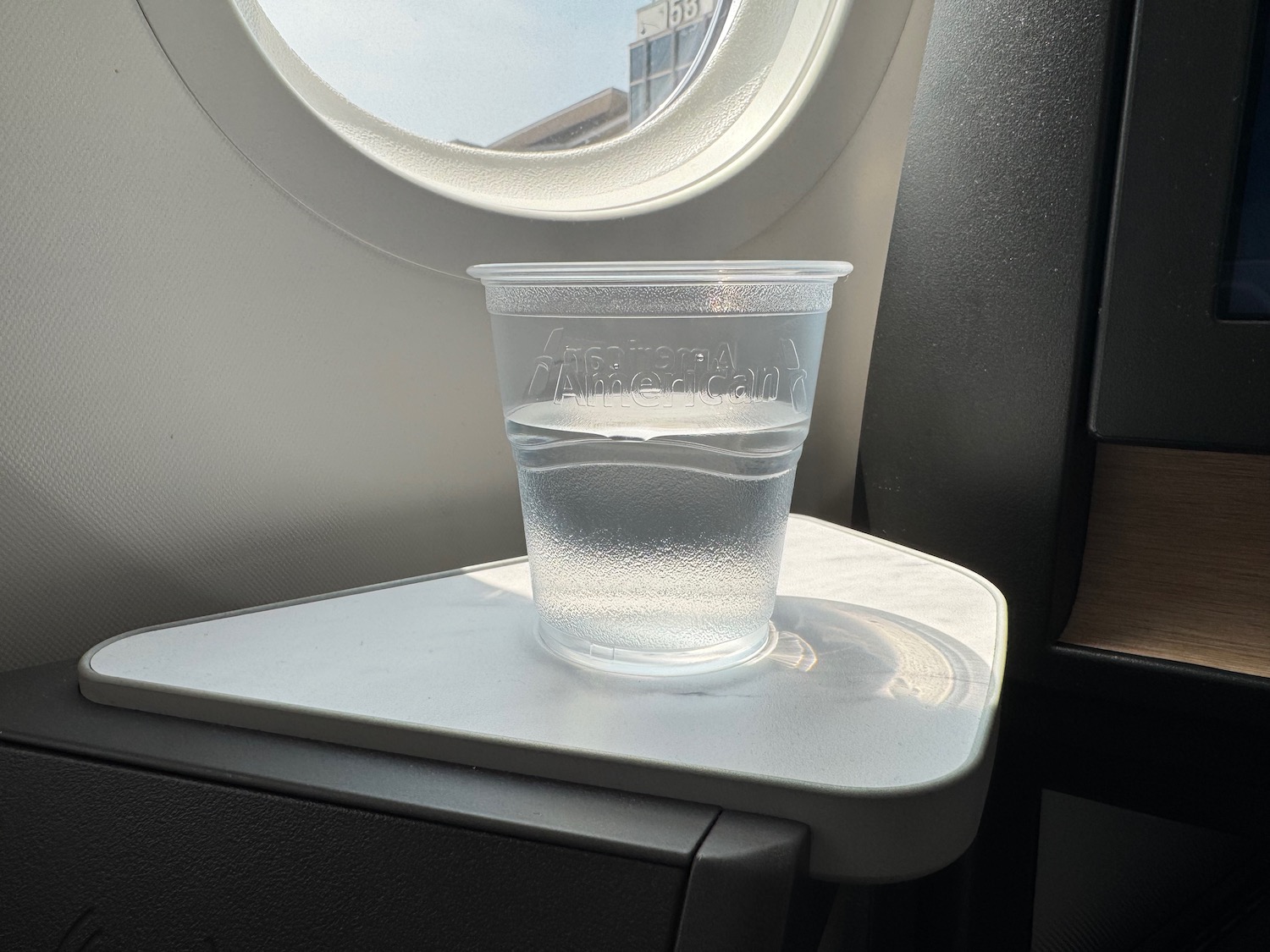 a cup of water on a table