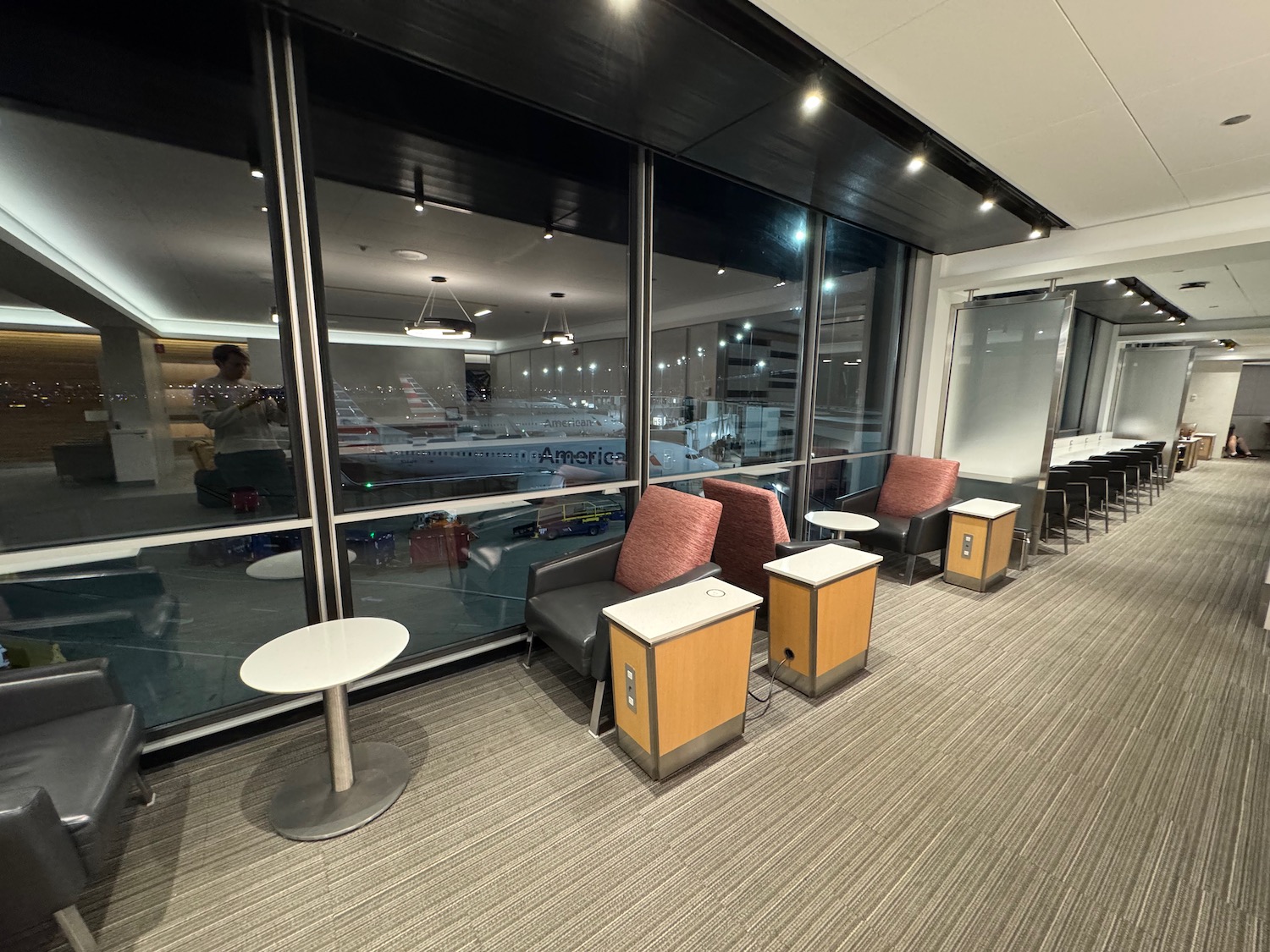 a room with chairs and tables
