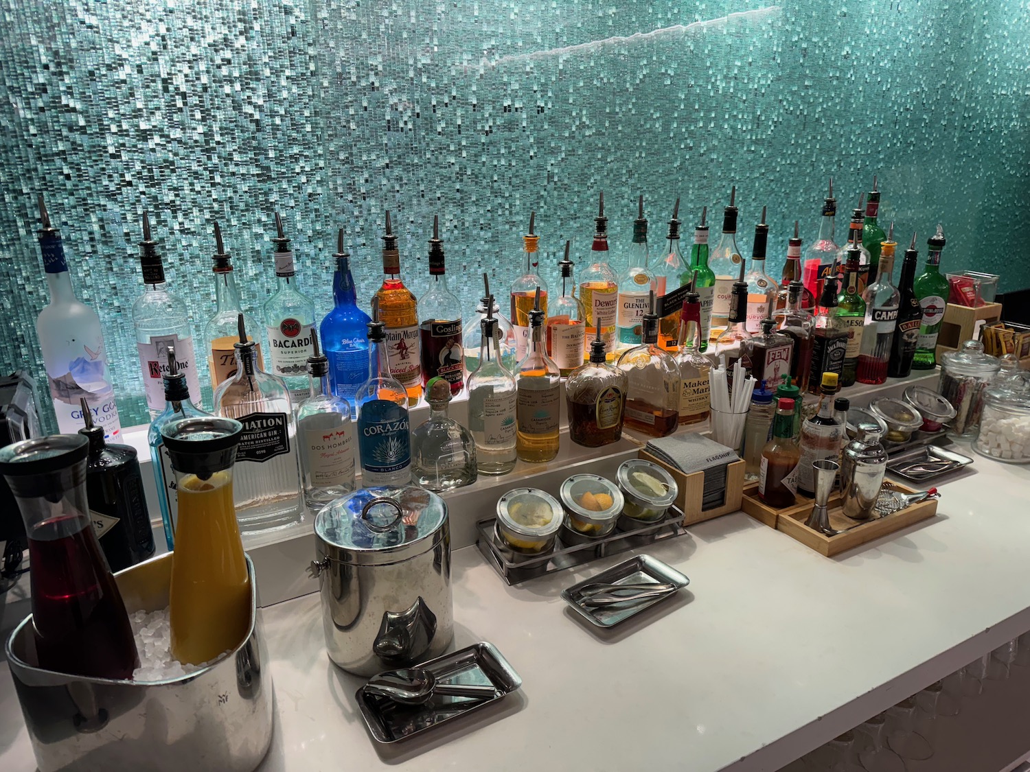 a bar with many bottles of alcohol