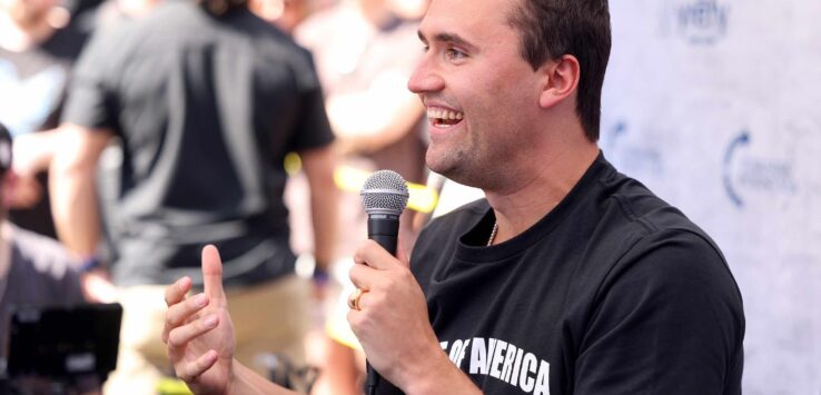 a man holding a microphone