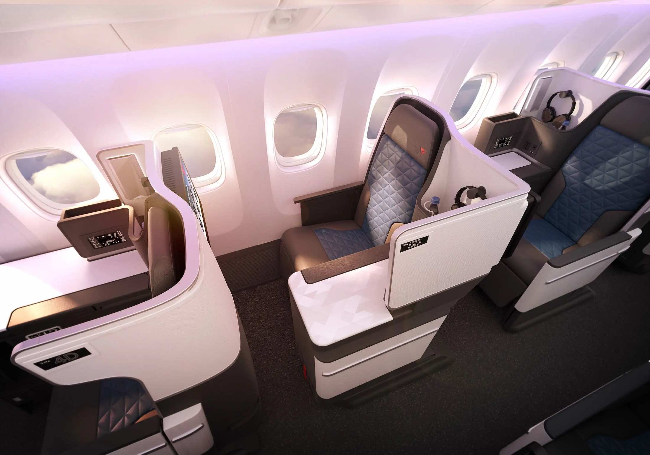 a seat and chairs in an airplane