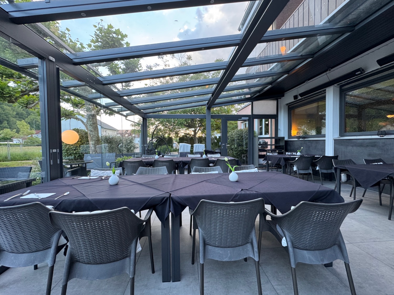 a table and chairs outside a restaurant
