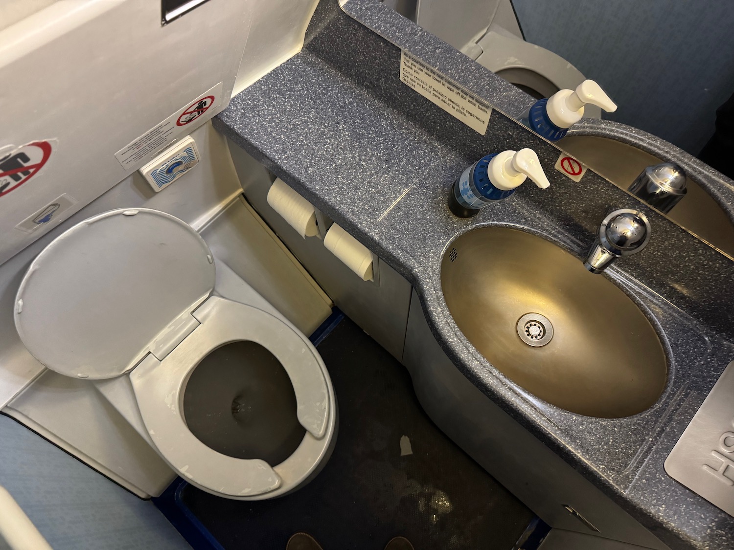 a sink and toilet in a bathroom