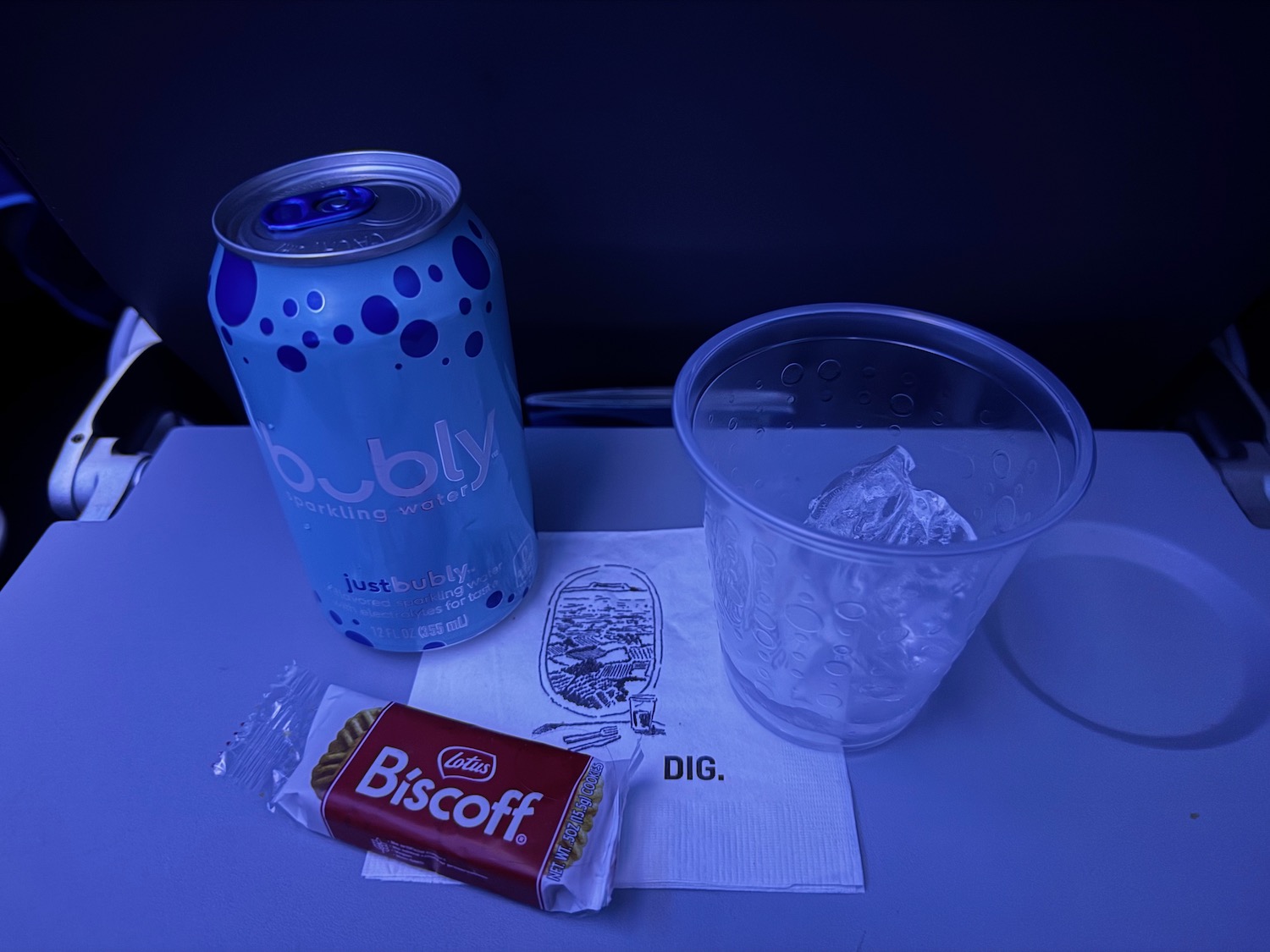 a can and a cup on a table