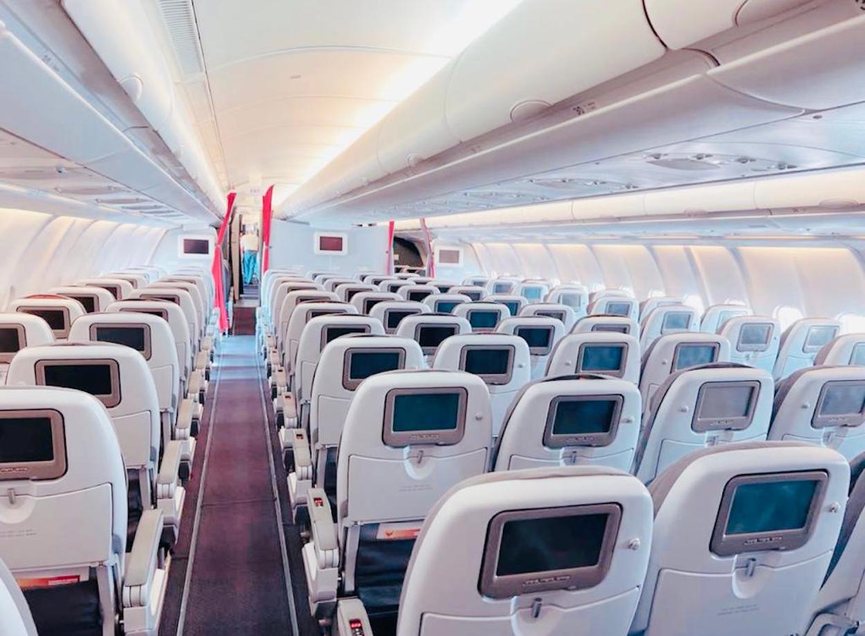 an airplane with rows of seats
