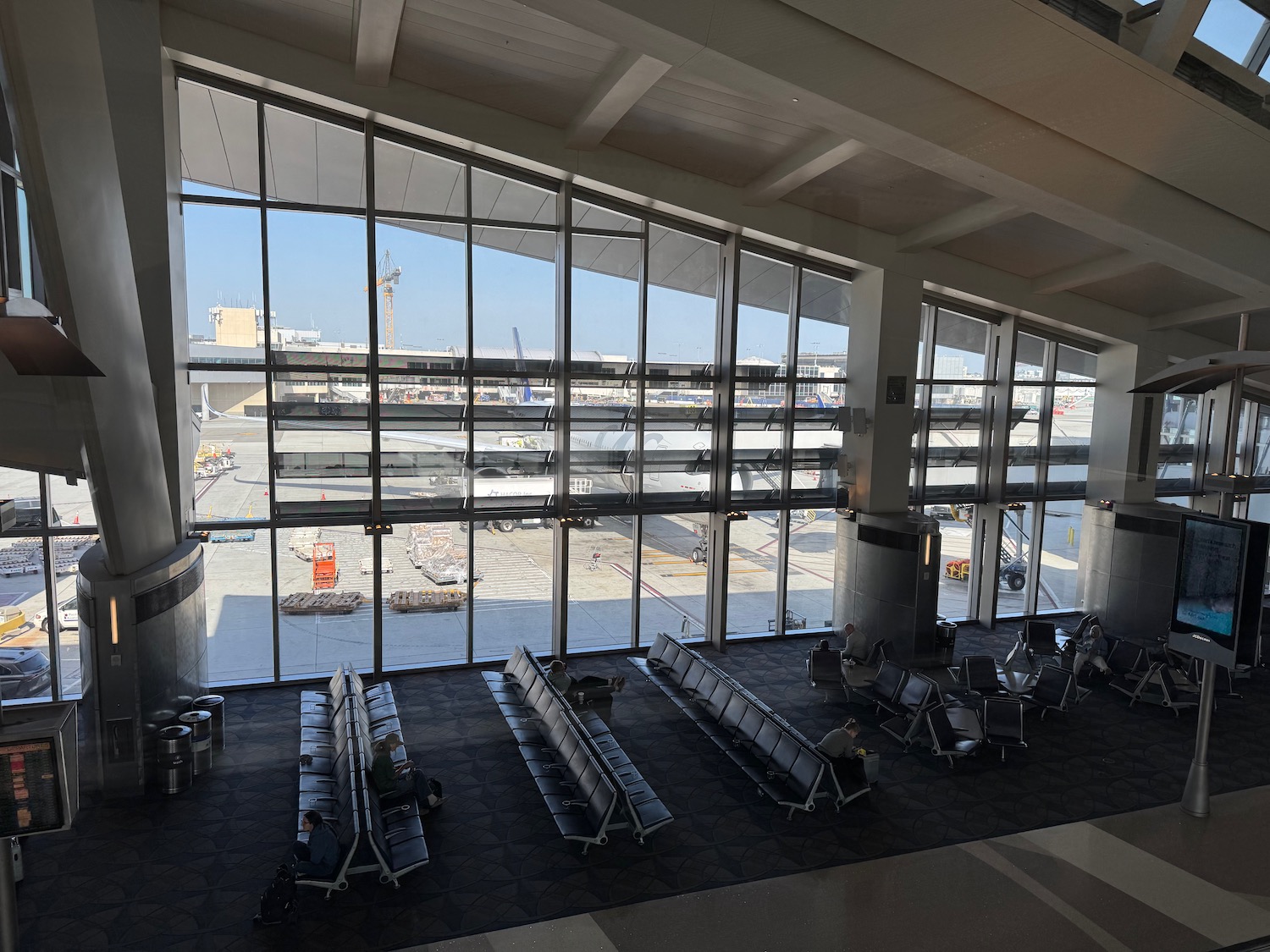 a large window with many chairs in a building