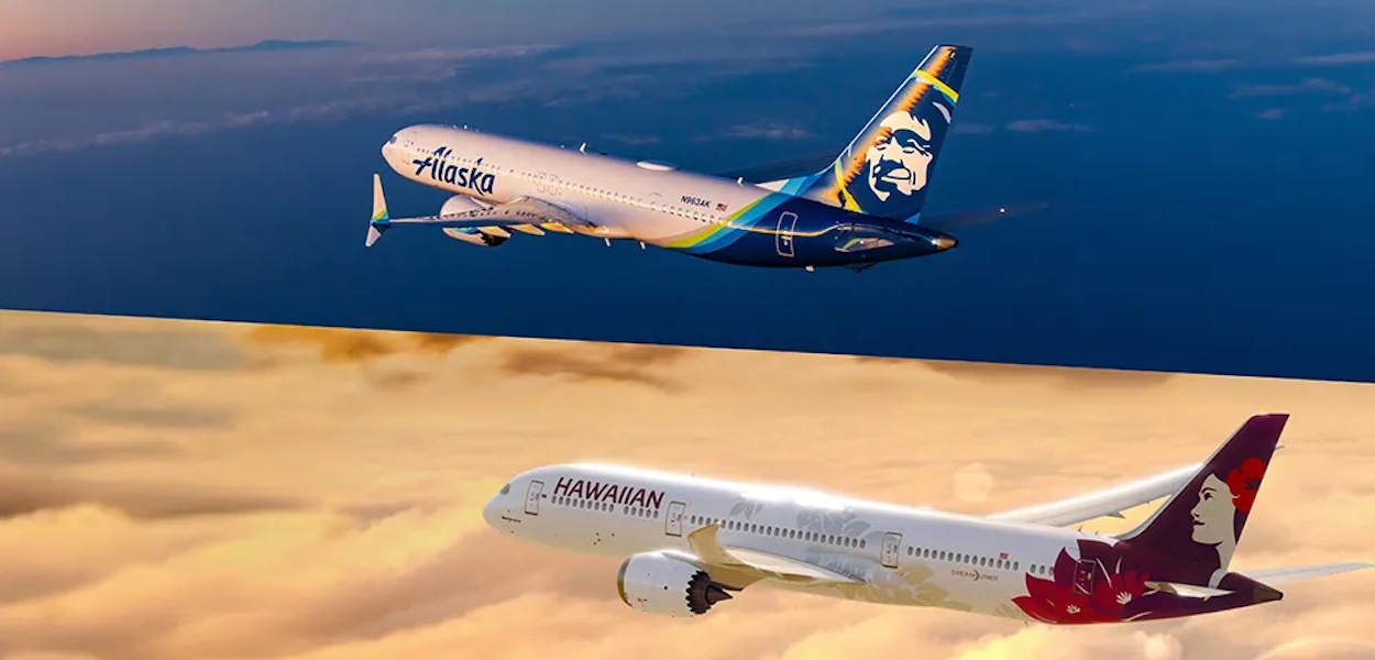 a couple of airplanes in the sky