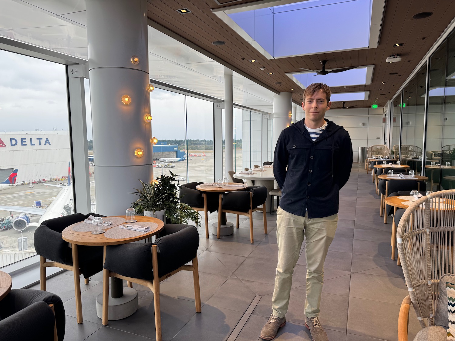 a man standing in a restaurant