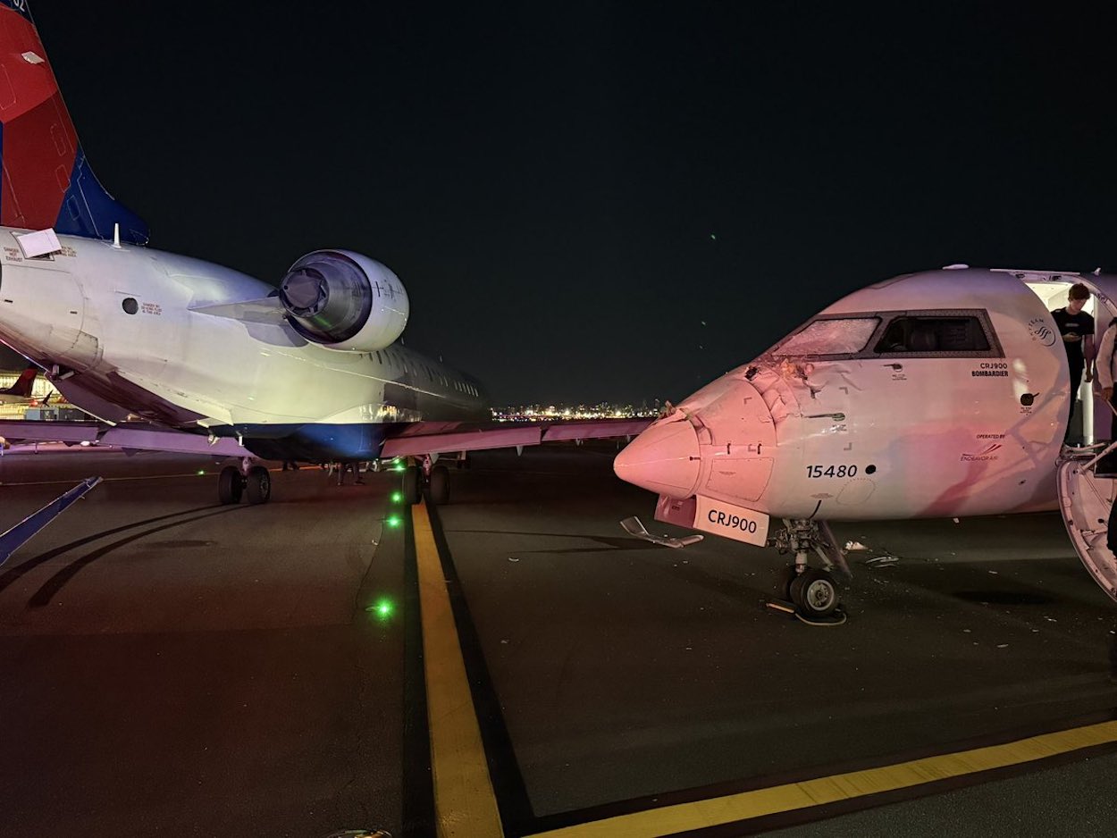 two airplanes on the runway