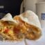a burrito with a bite taken out of it
