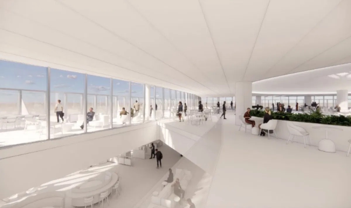 a large white room with many people
