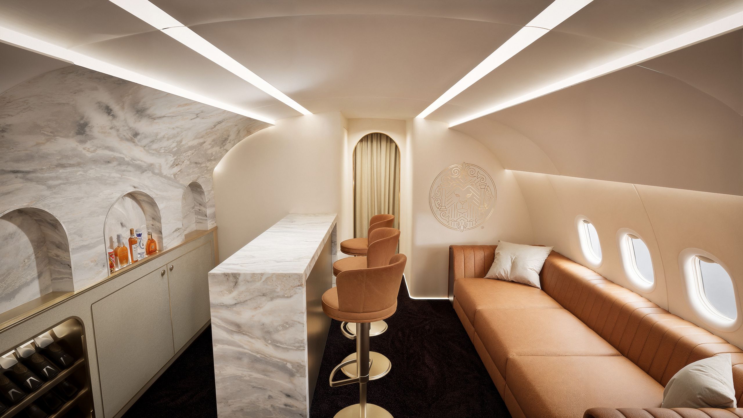 a room with a couch and bar stools