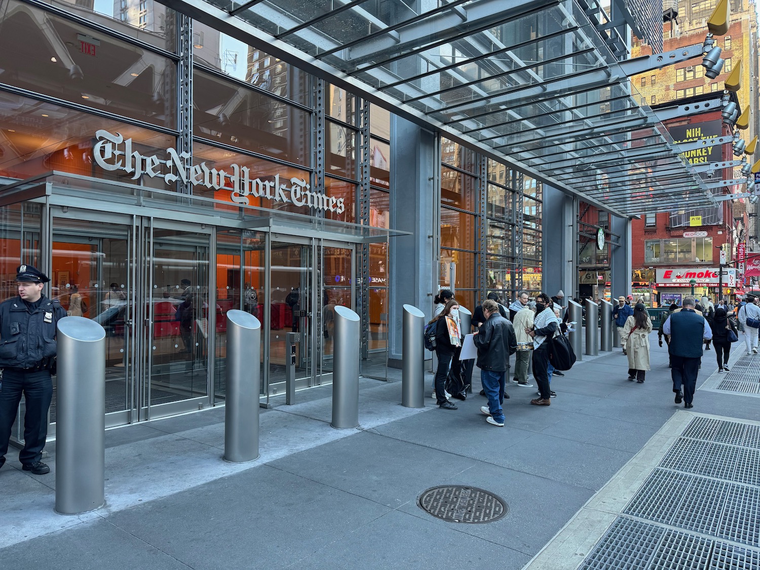 people walking on the sidewalk