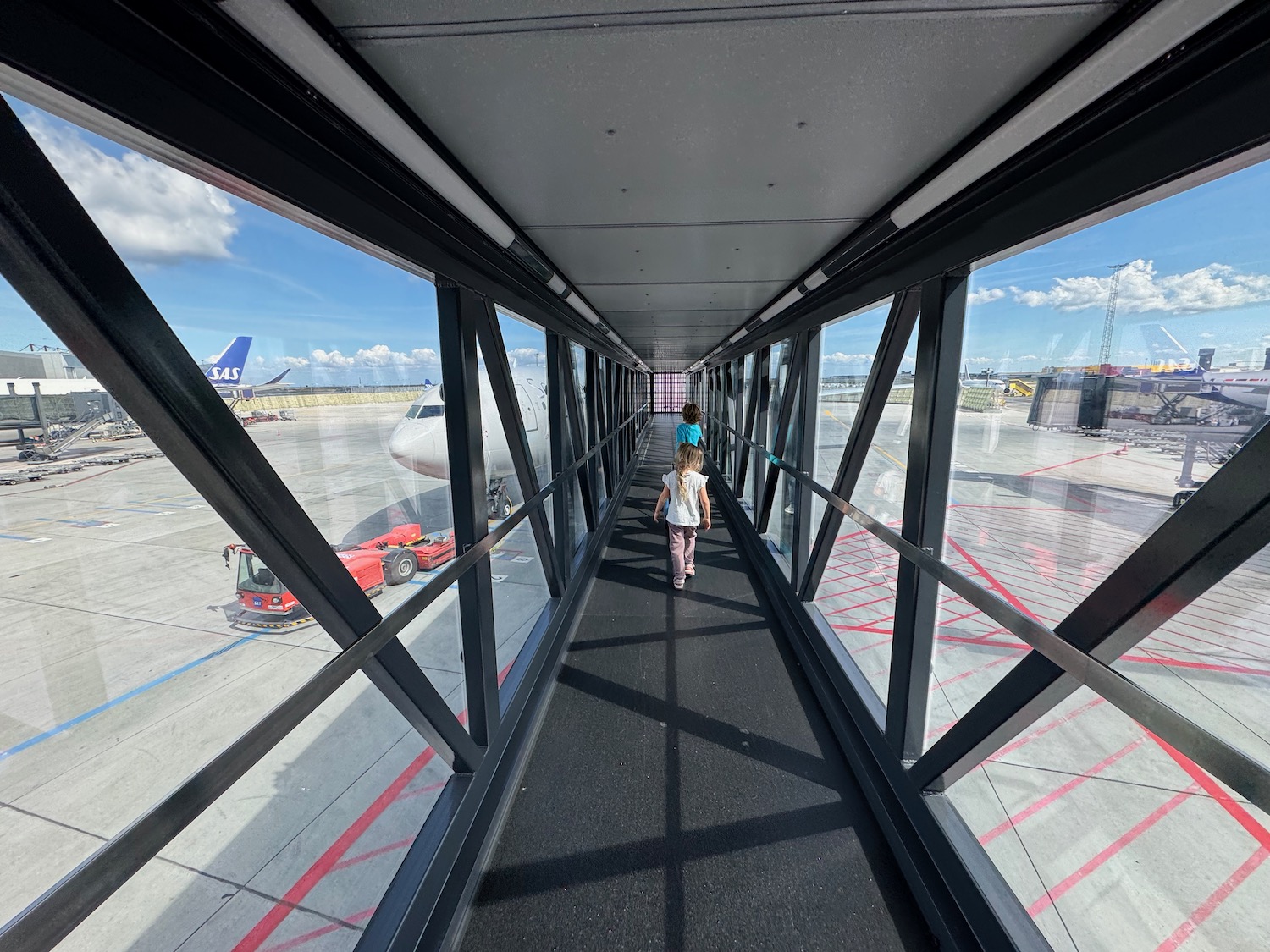 a child walking on a walkway