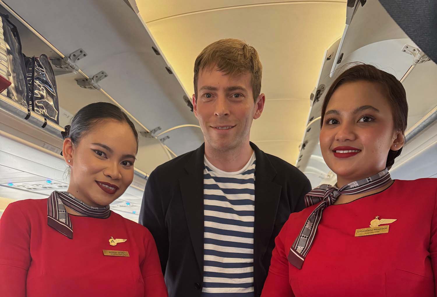 a man and two women posing for a picture