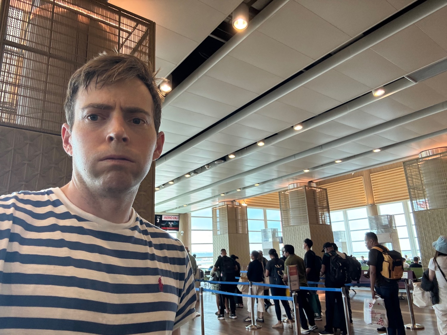 a man in a striped shirt