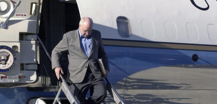 a man walking down a plane