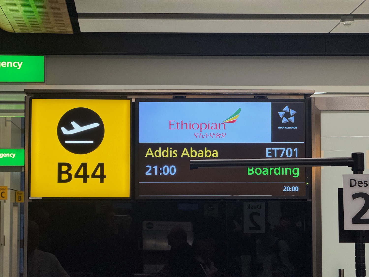 a sign with a plane and an airplane